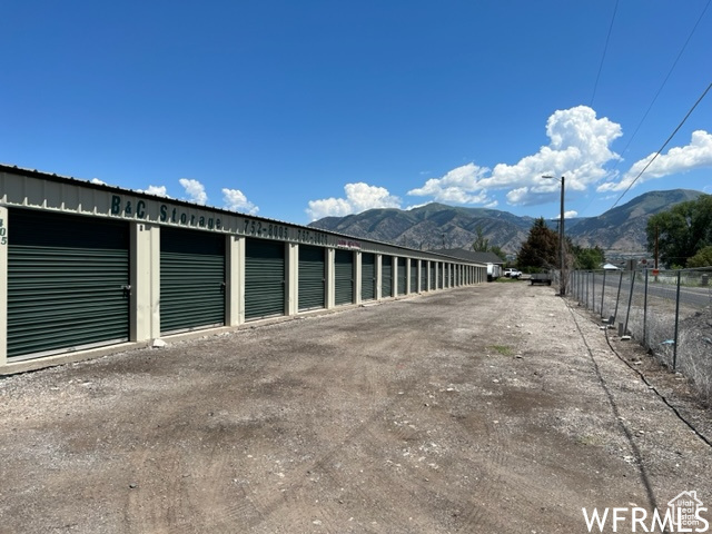 Garage featuring a mountain view