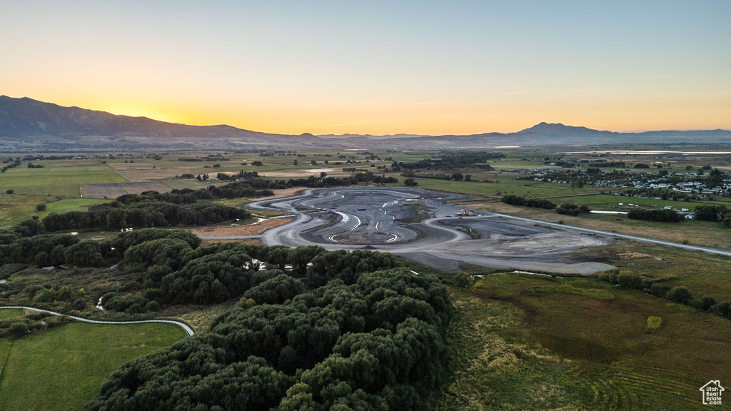 Aerial view at dusk with a mountain view and a rural view