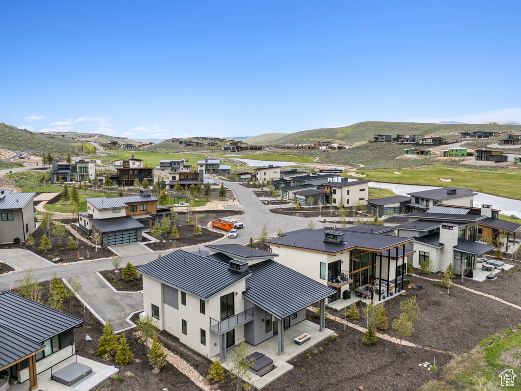 Aerial view of residential area with a mountain backdrop