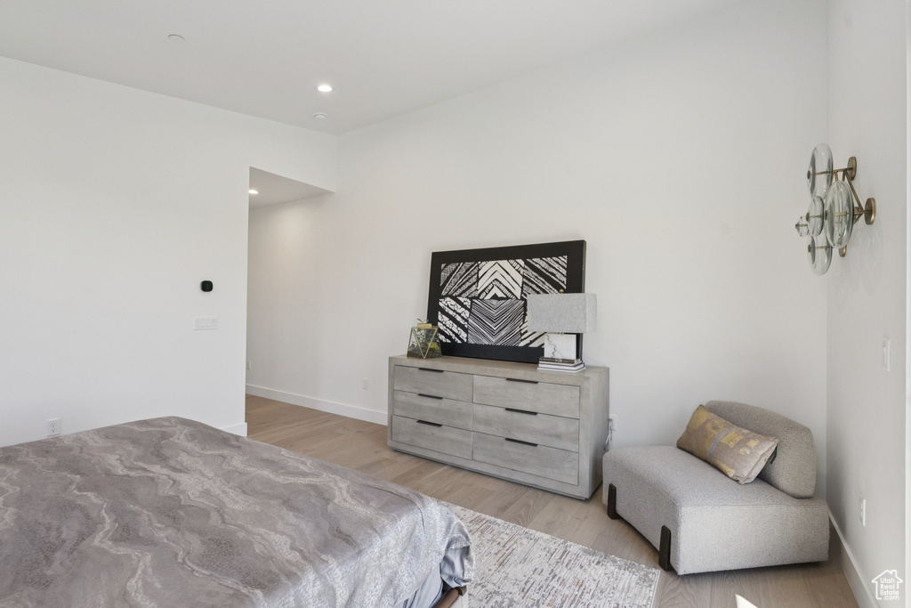Bedroom featuring light wood-style flooring and recessed lighting