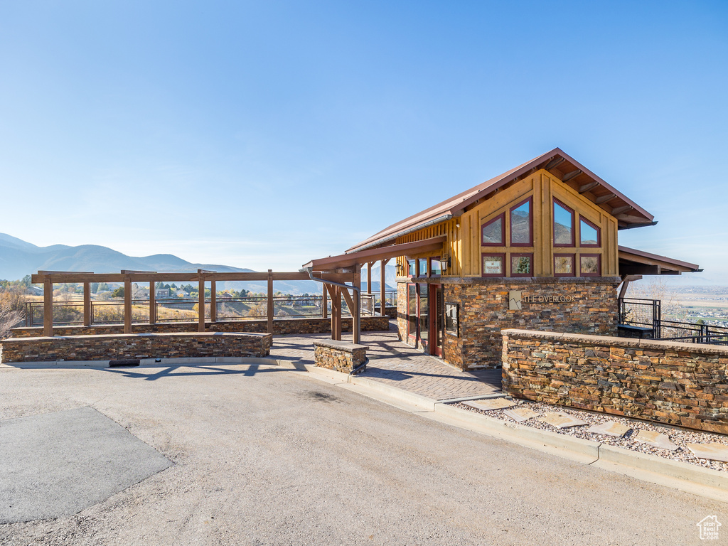 View of front of house featuring a mountain view