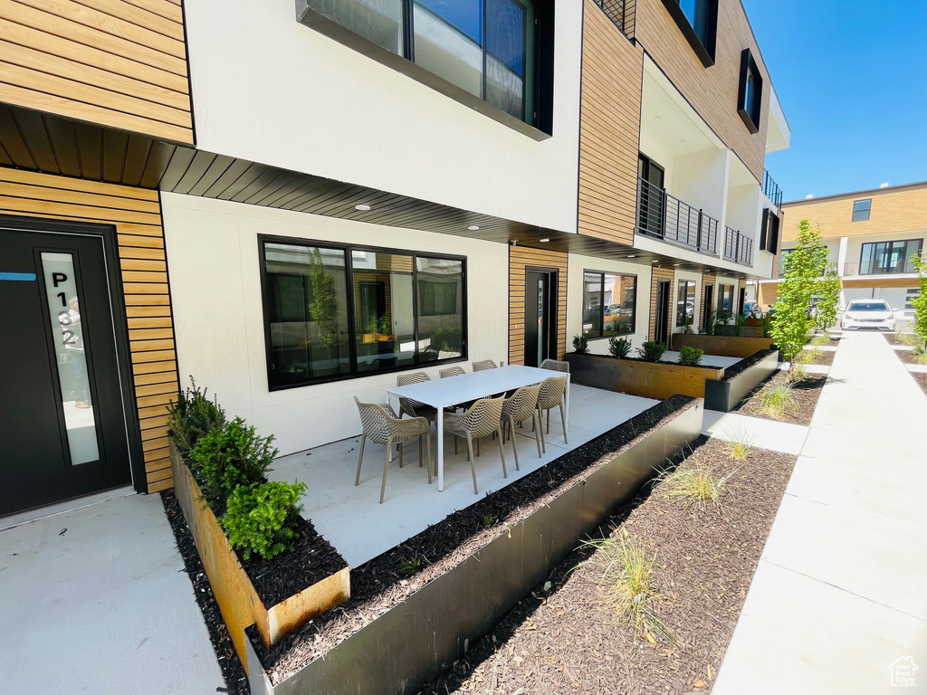 View of patio with outdoor dining space