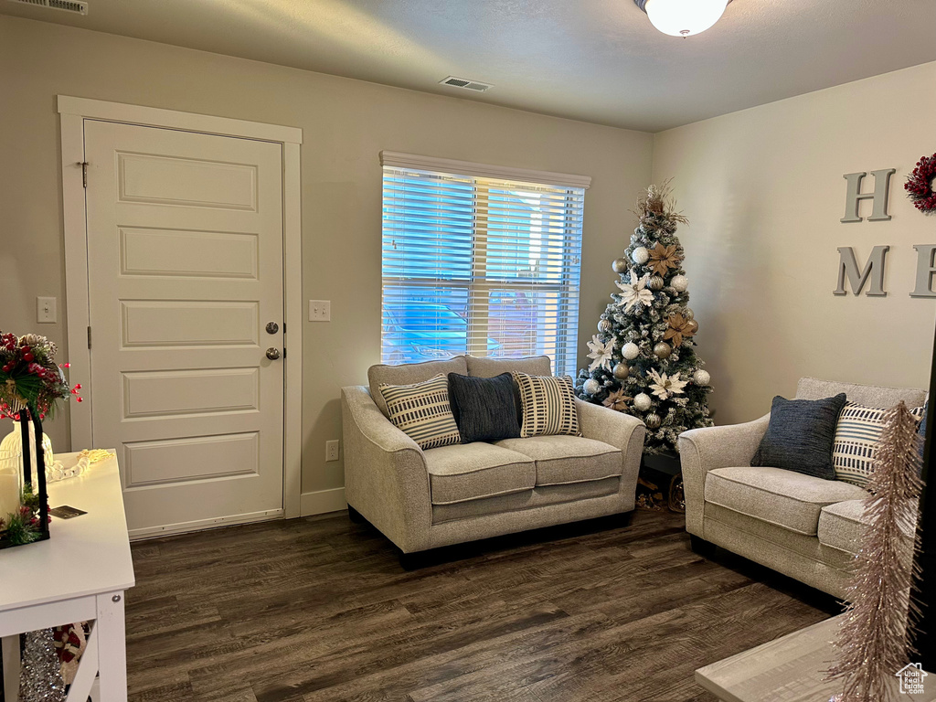 Living room featuring dark hardwood / wood-style floors