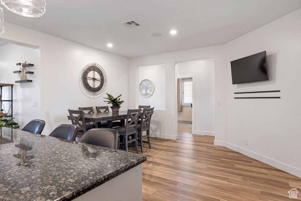 Dining area featuring light wood-type flooring