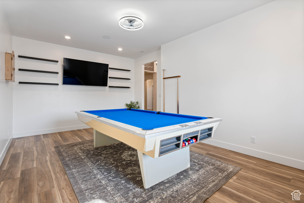 Rec room with hardwood / wood-style floors and billiards