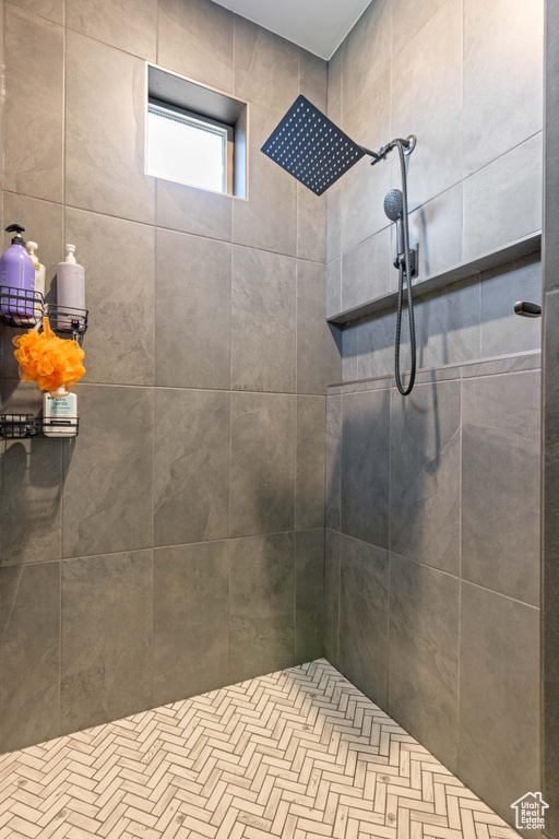 Bathroom with tiled shower