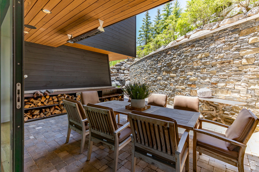 View of patio featuring outdoor dining area