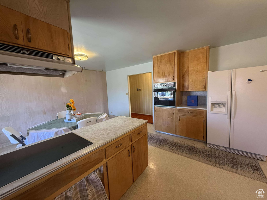 Kitchen with black appliances