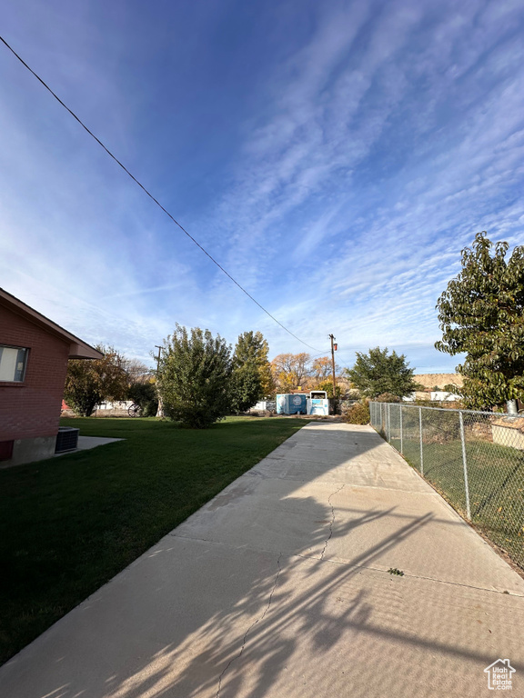 Exterior space featuring a front lawn