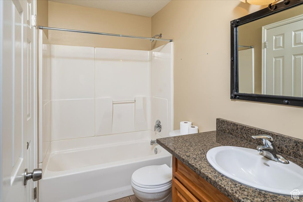 Full bathroom with vanity, toilet, and bathtub / shower combination