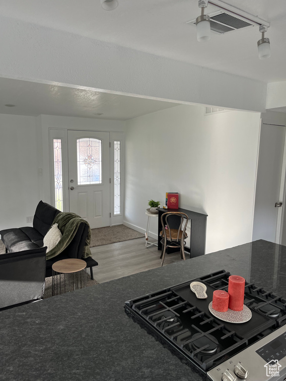 Living area with wood finished floors