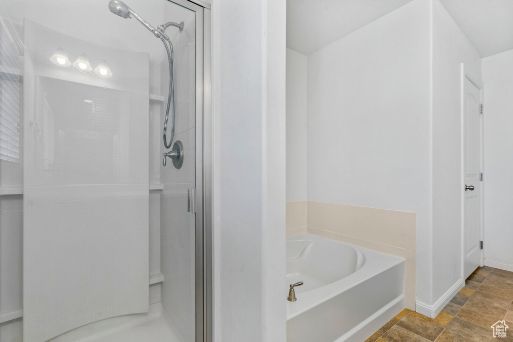 Bathroom with independent shower and bath