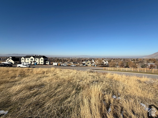 Birds eye view of property featuring a rural view