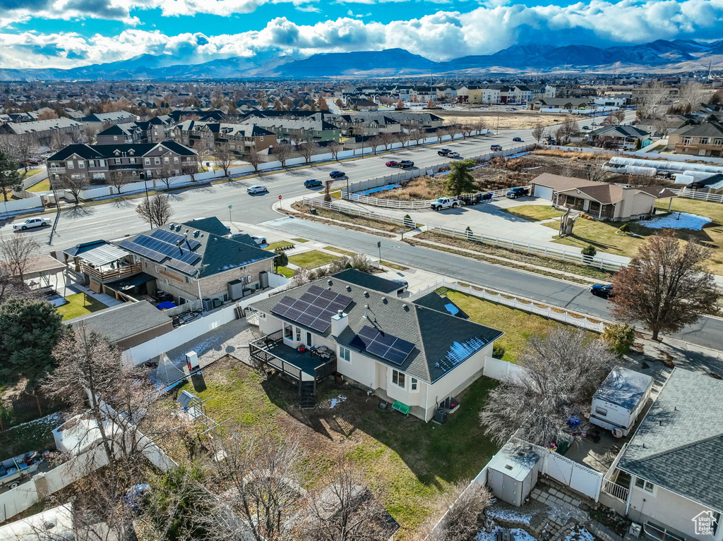 Birds eye view of property featuring a mountain view