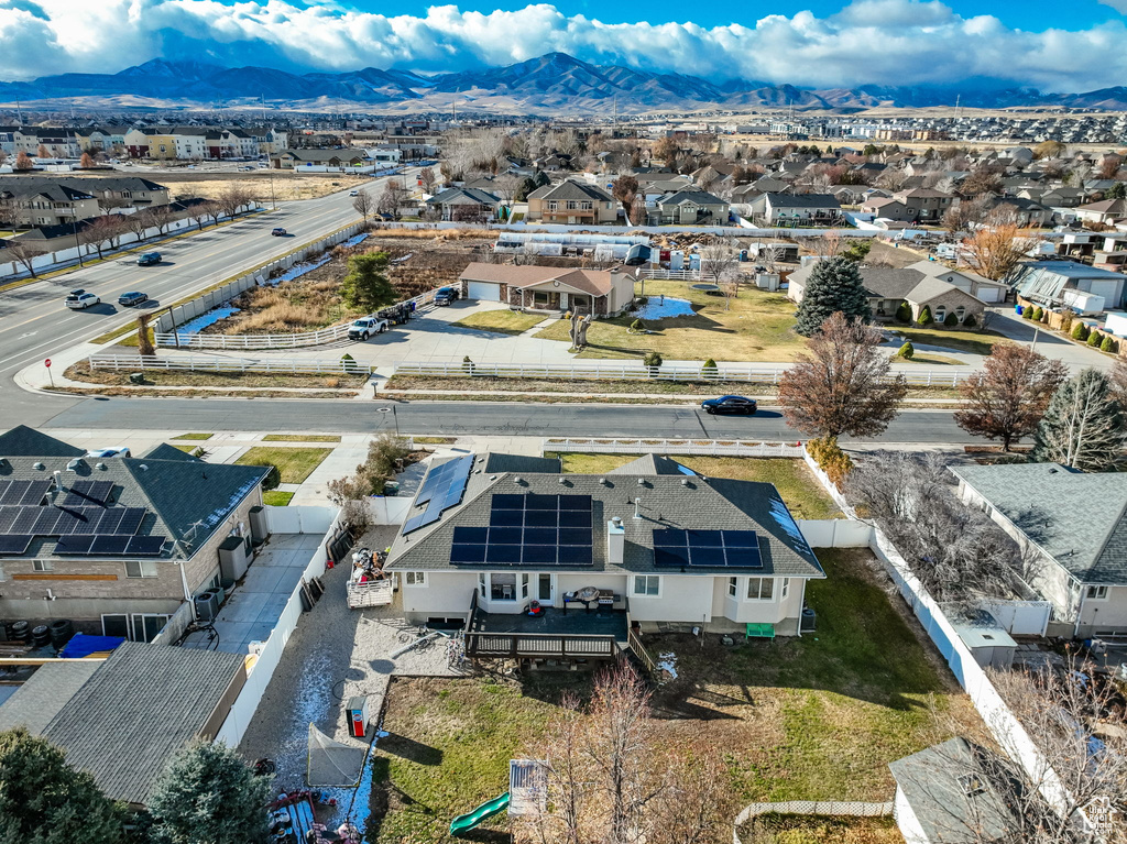 Birds eye view of property featuring a mountain view