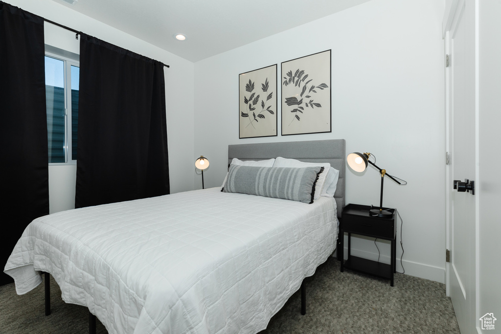 View of carpeted bedroom