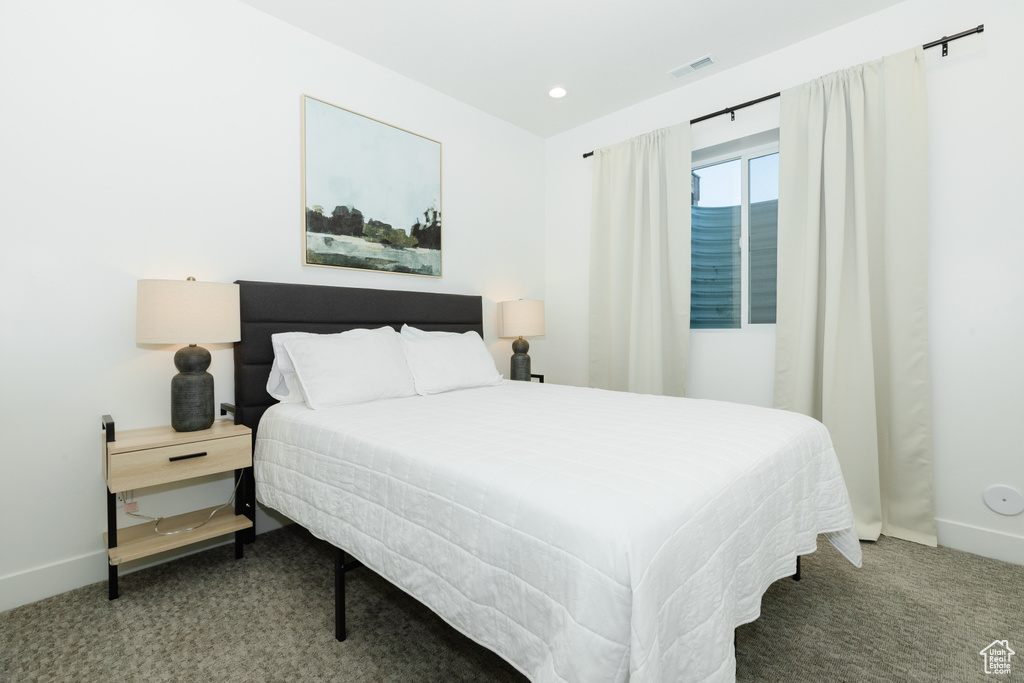 Bedroom featuring carpet floors