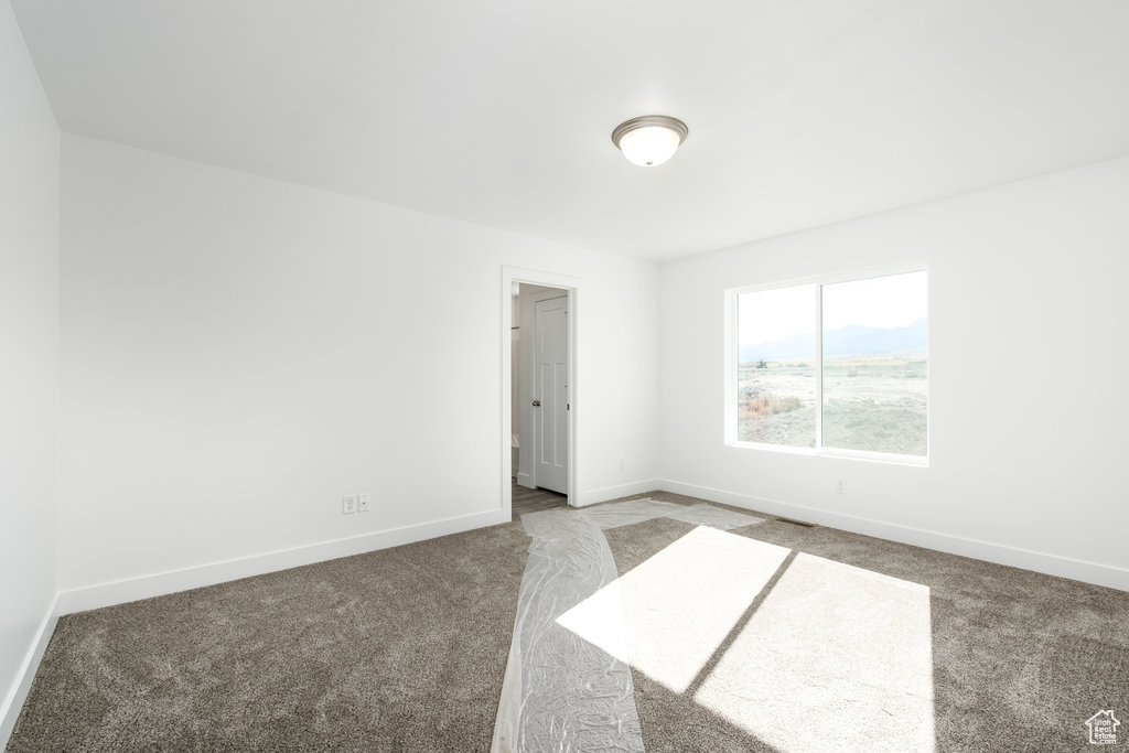 Empty room featuring carpet