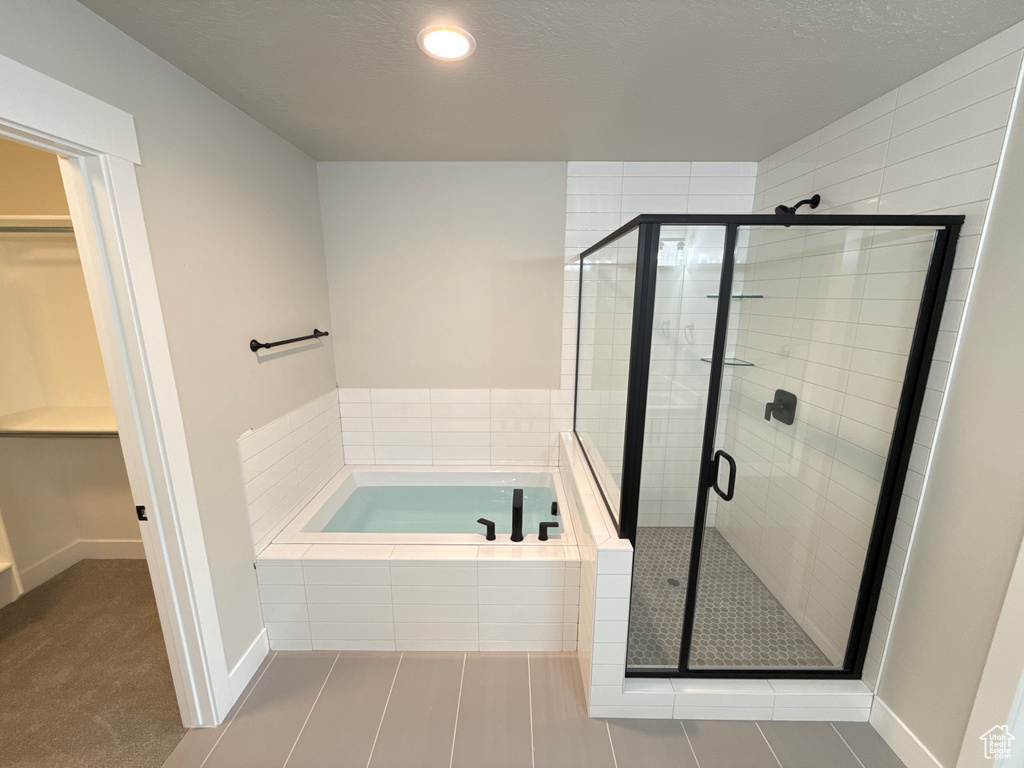 Bathroom with separate shower and tub