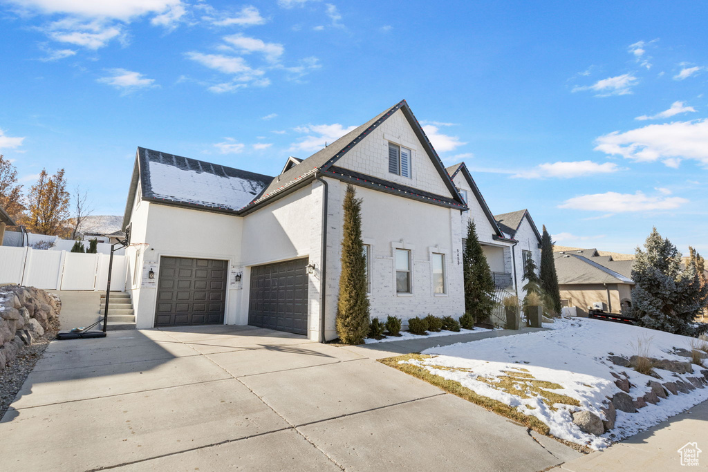 View of home\'s exterior with a garage