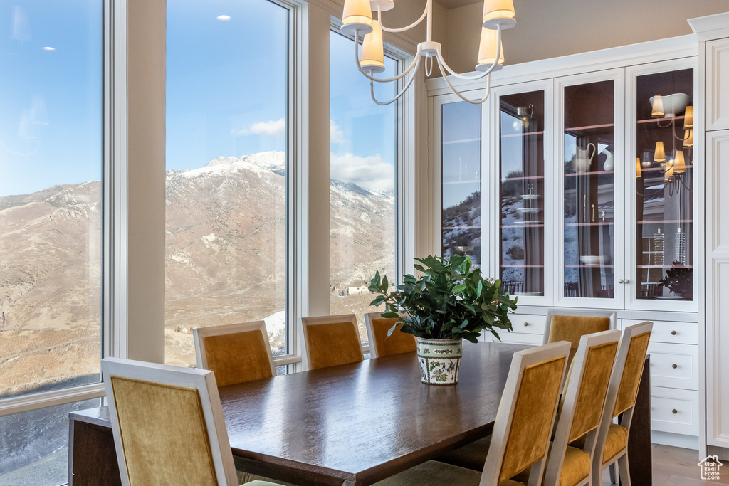 Dining room with a mountain view and plenty of natural light