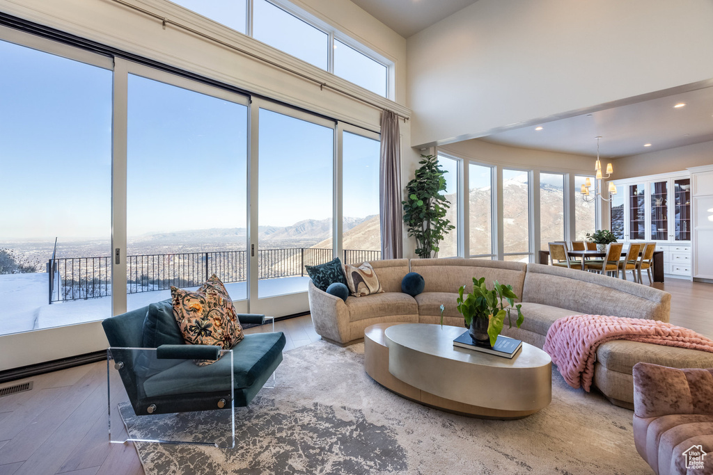 Living room featuring plenty of natural light and wood-type flooring