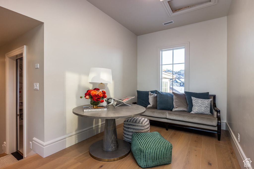 Living area with wood-type flooring