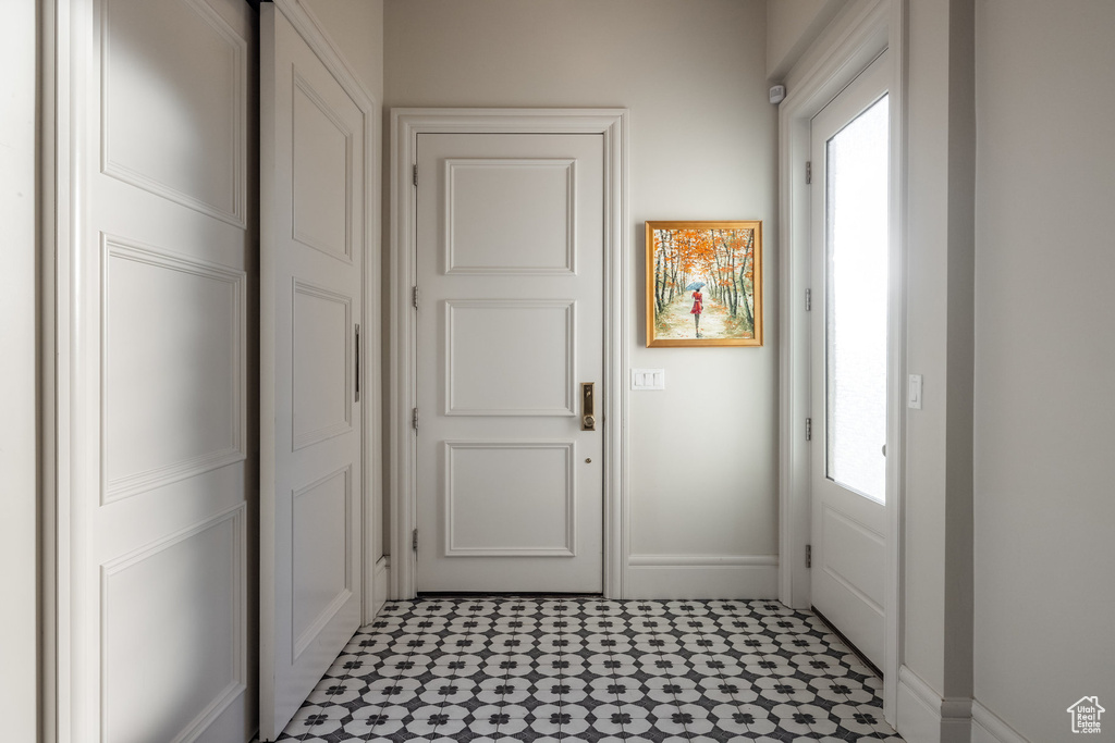 Doorway to outside featuring plenty of natural light