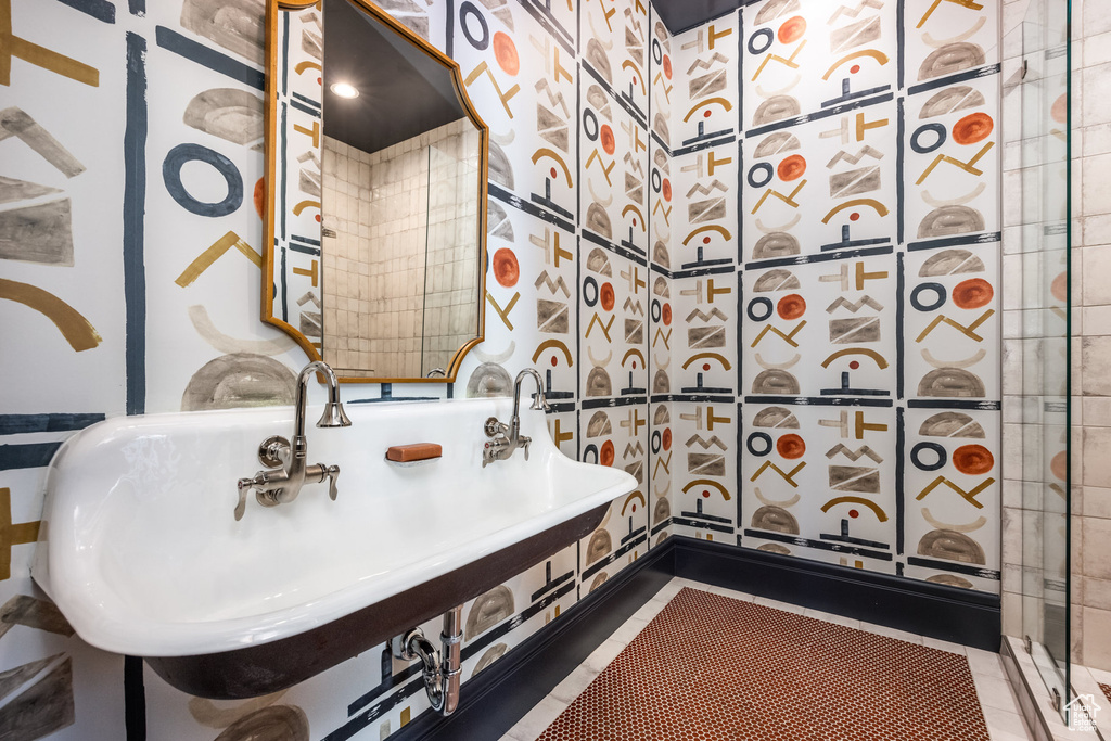 Full bath featuring a sink