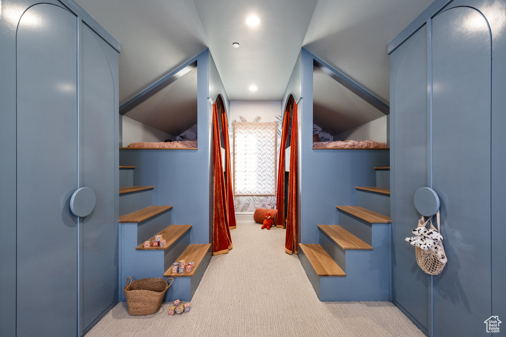 Hallway with light carpet