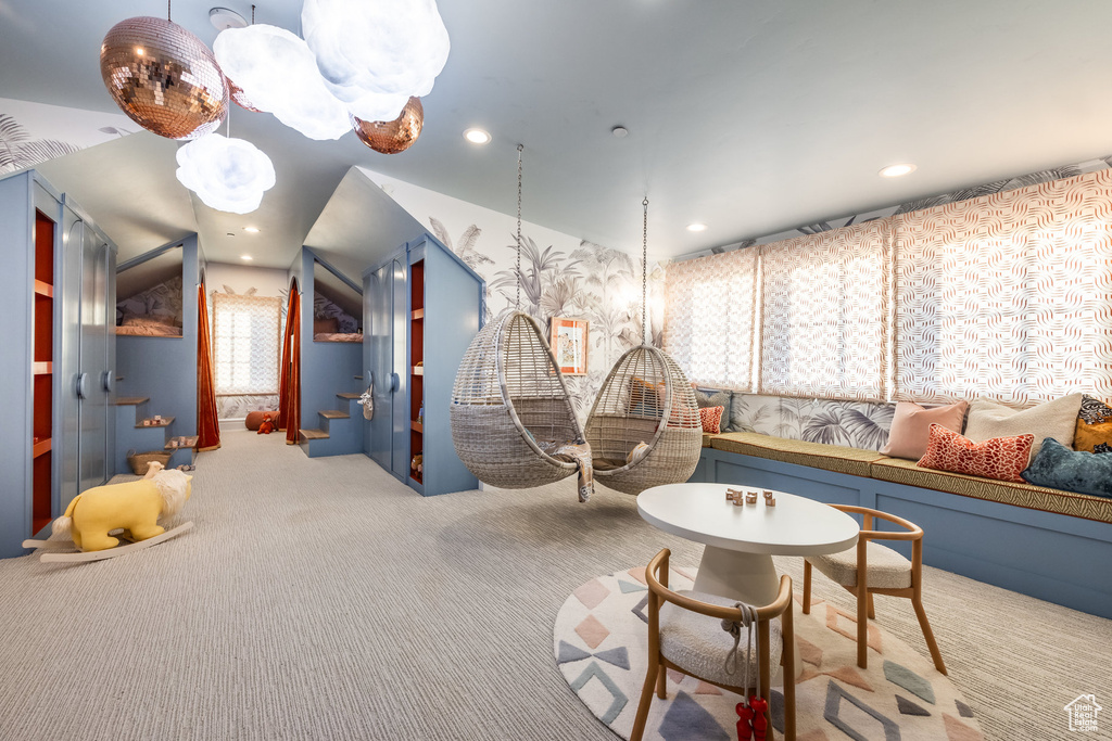 Rec room with carpet flooring