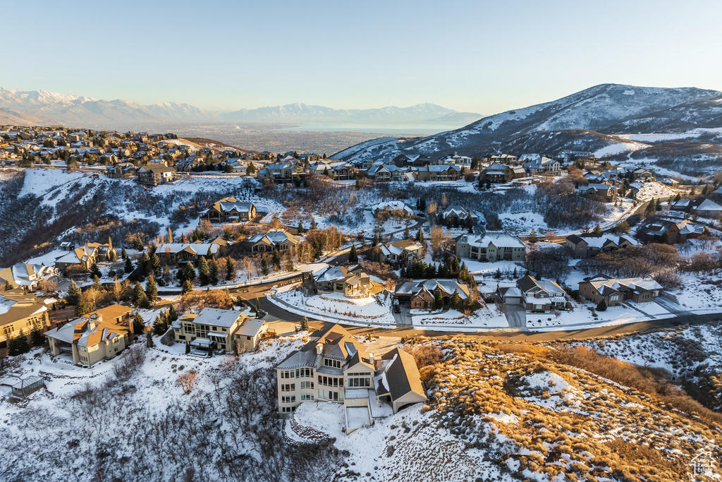 View of mountain background featuring nearby suburban area