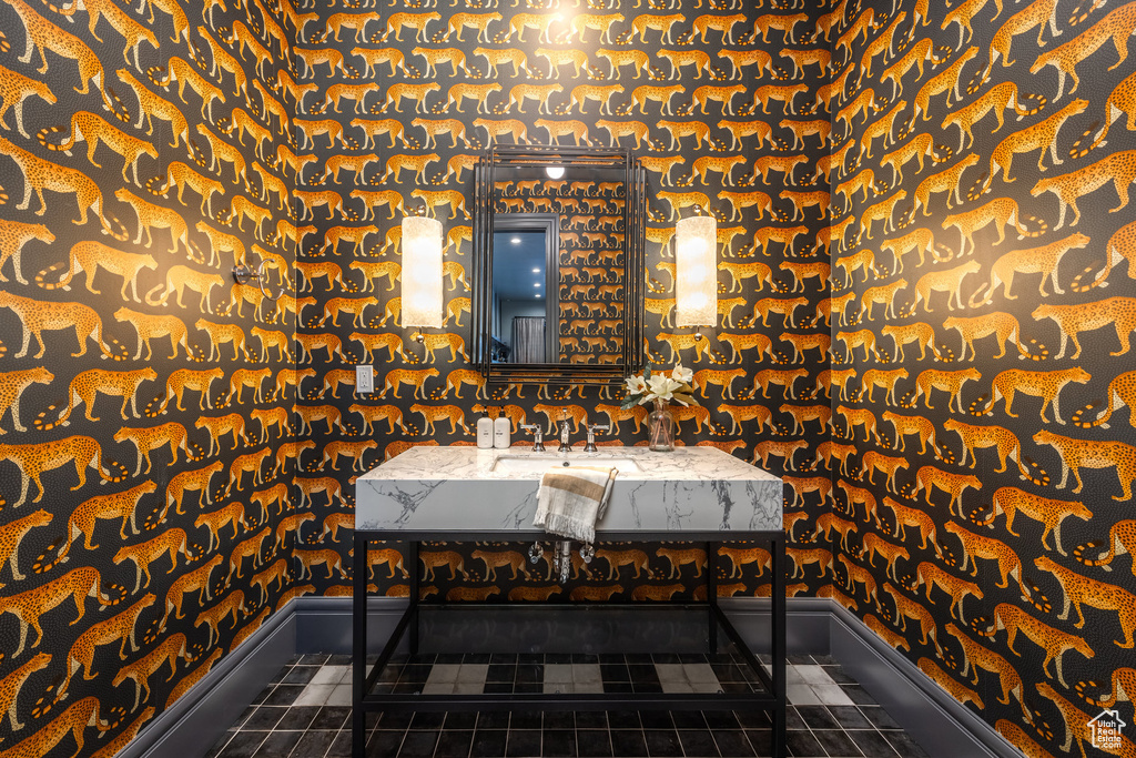 Bathroom featuring tile patterned floors