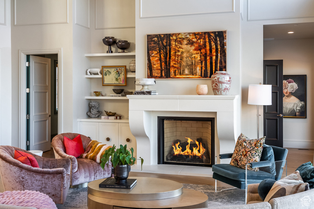 Living area featuring hardwood / wood-style flooring