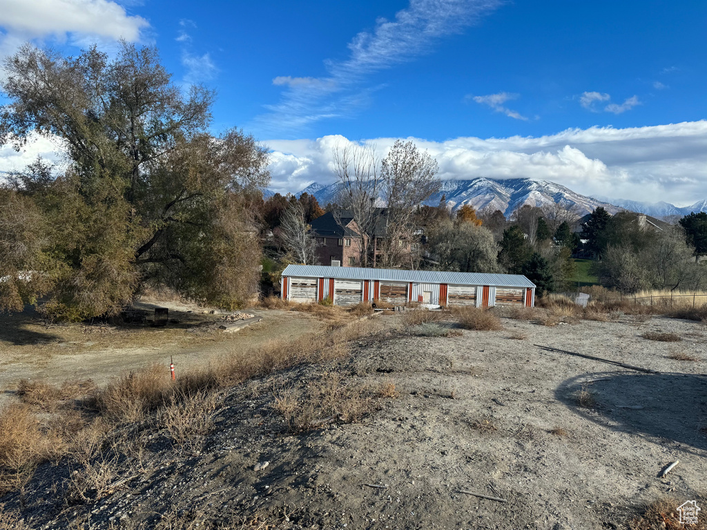 View of front of home featuring a mountain view