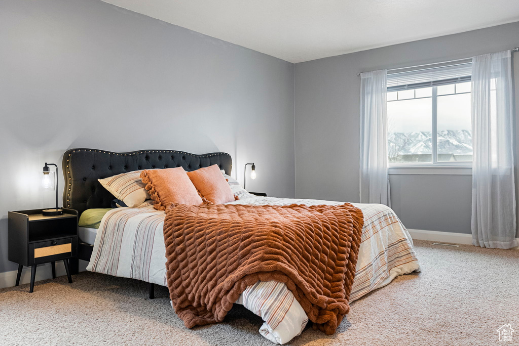 Bedroom featuring carpet flooring