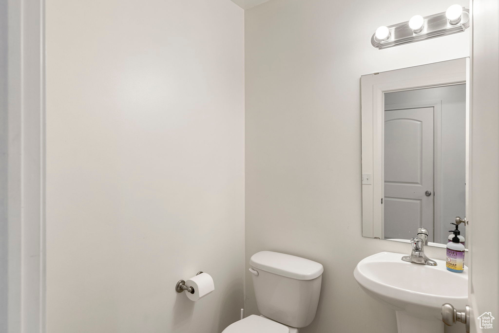 Bathroom with toilet and sink