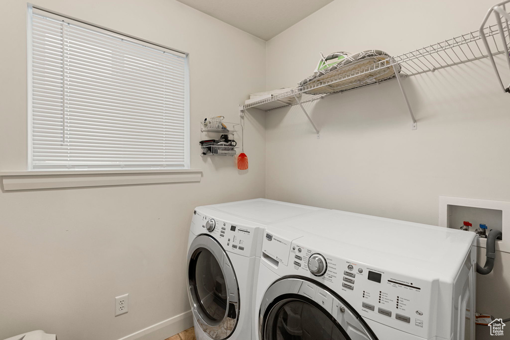 Washroom featuring separate washer and dryer
