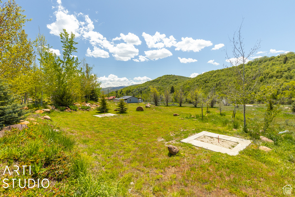 Property view of mountains featuring a rural view