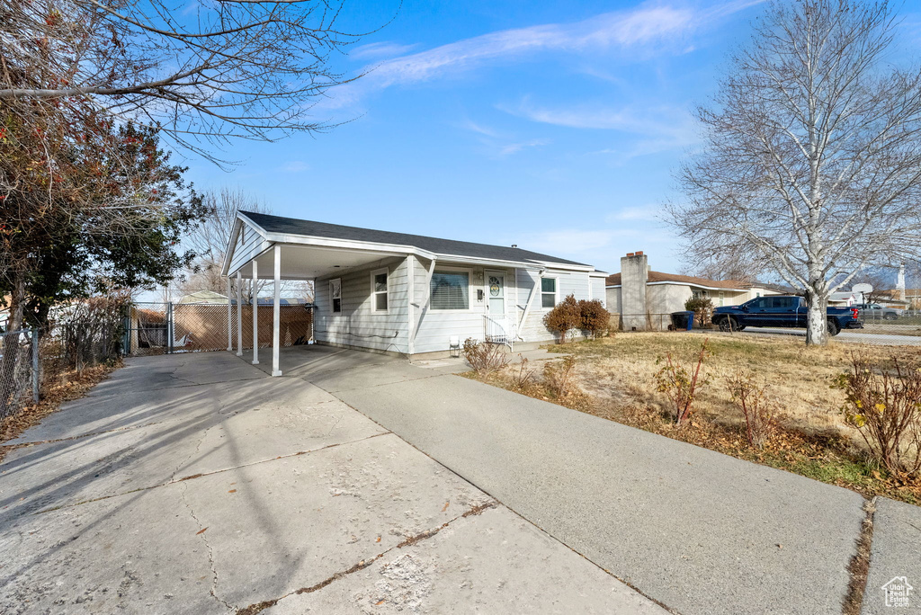 Ranch-style home with a carport