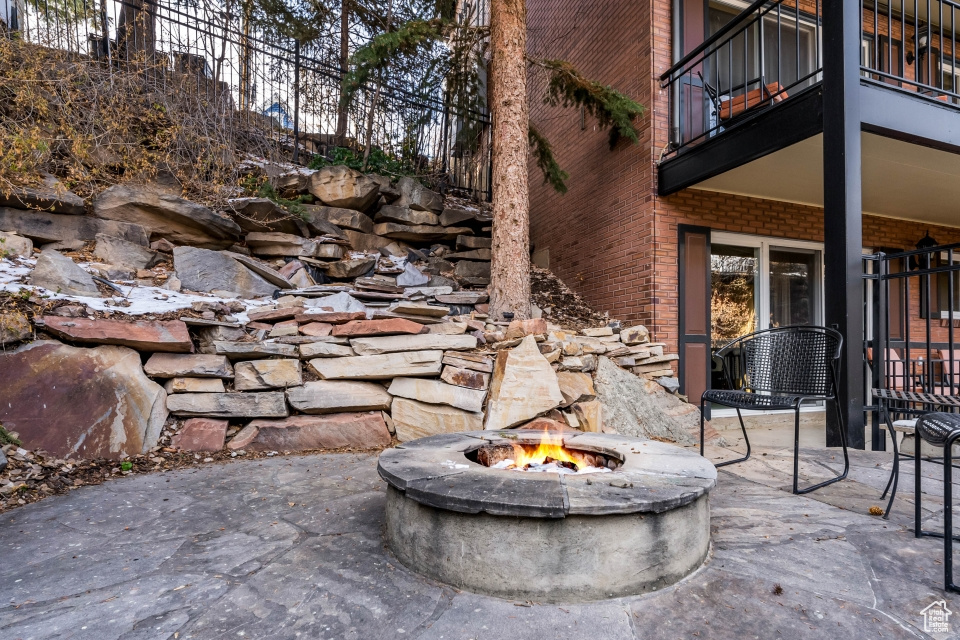View of patio / terrace featuring a fire pit