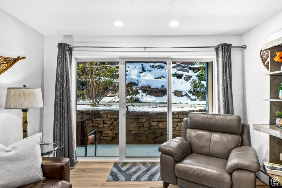 Sitting room featuring light hardwood / wood-style floors
