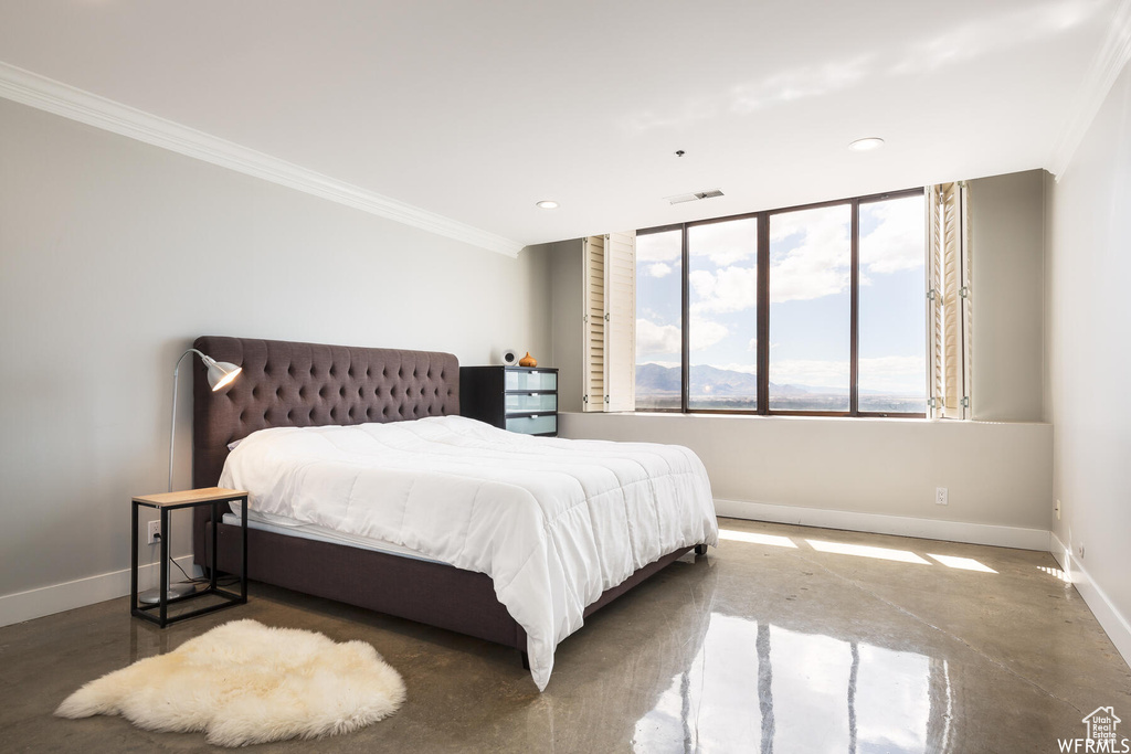 Bedroom with ornamental molding