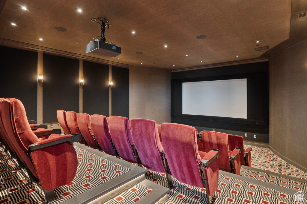 Carpeted cinema featuring recessed lighting