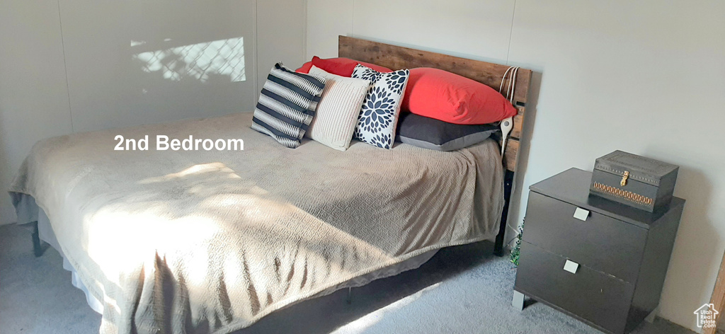 Bedroom featuring carpet floors