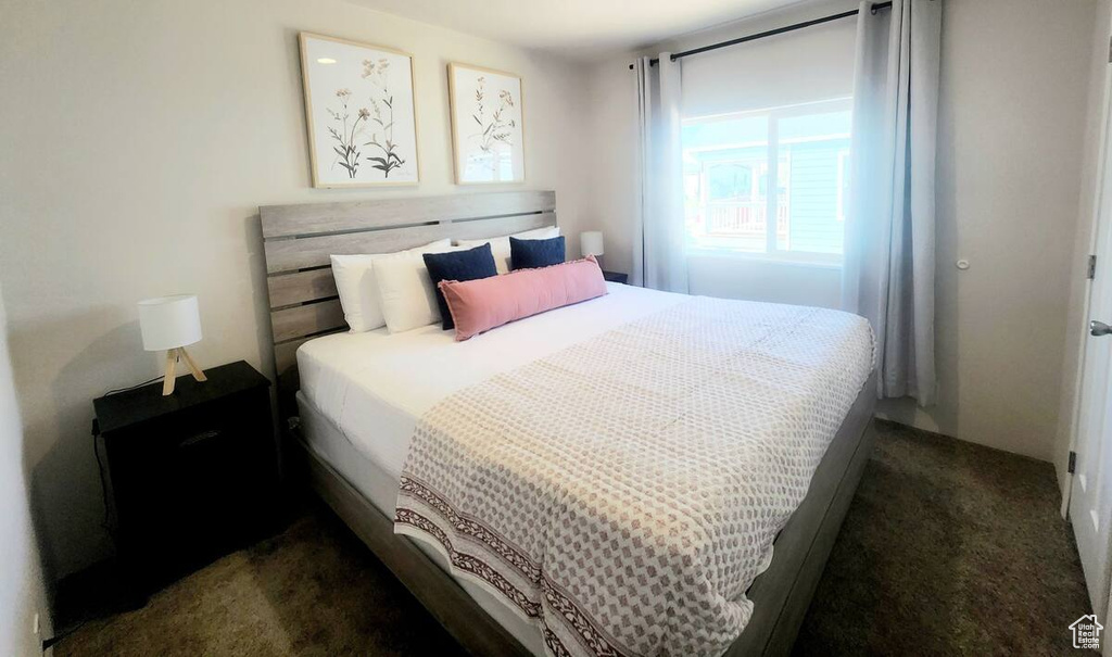 View of carpeted bedroom