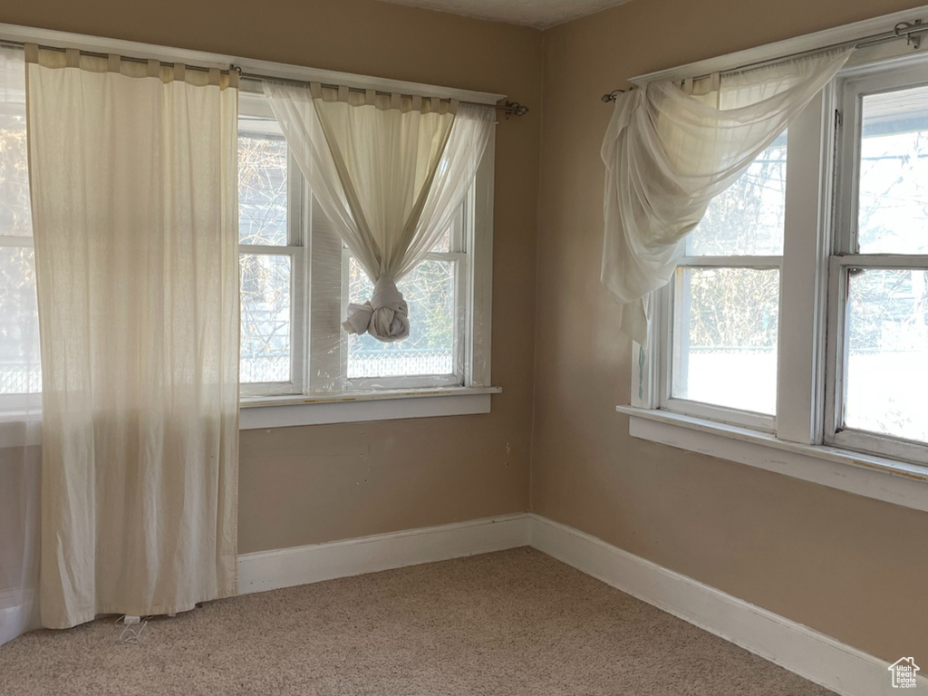 View of carpeted spare room