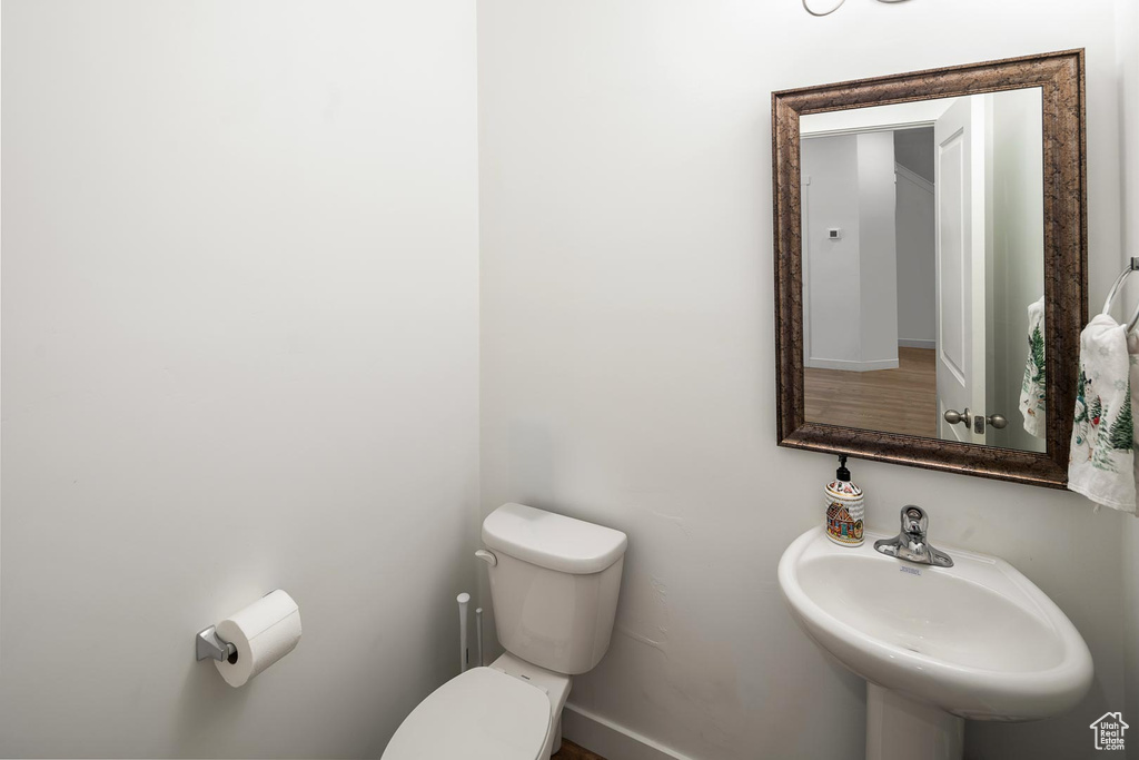 Bathroom with sink and toilet