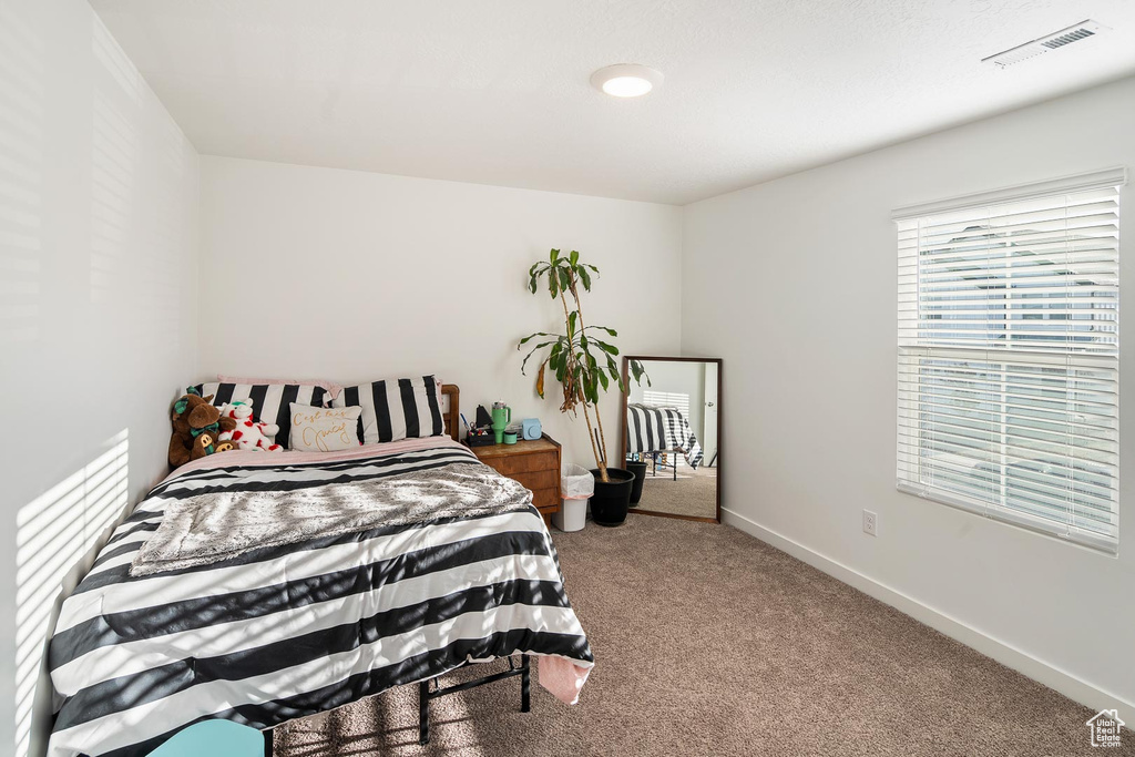 View of carpeted bedroom