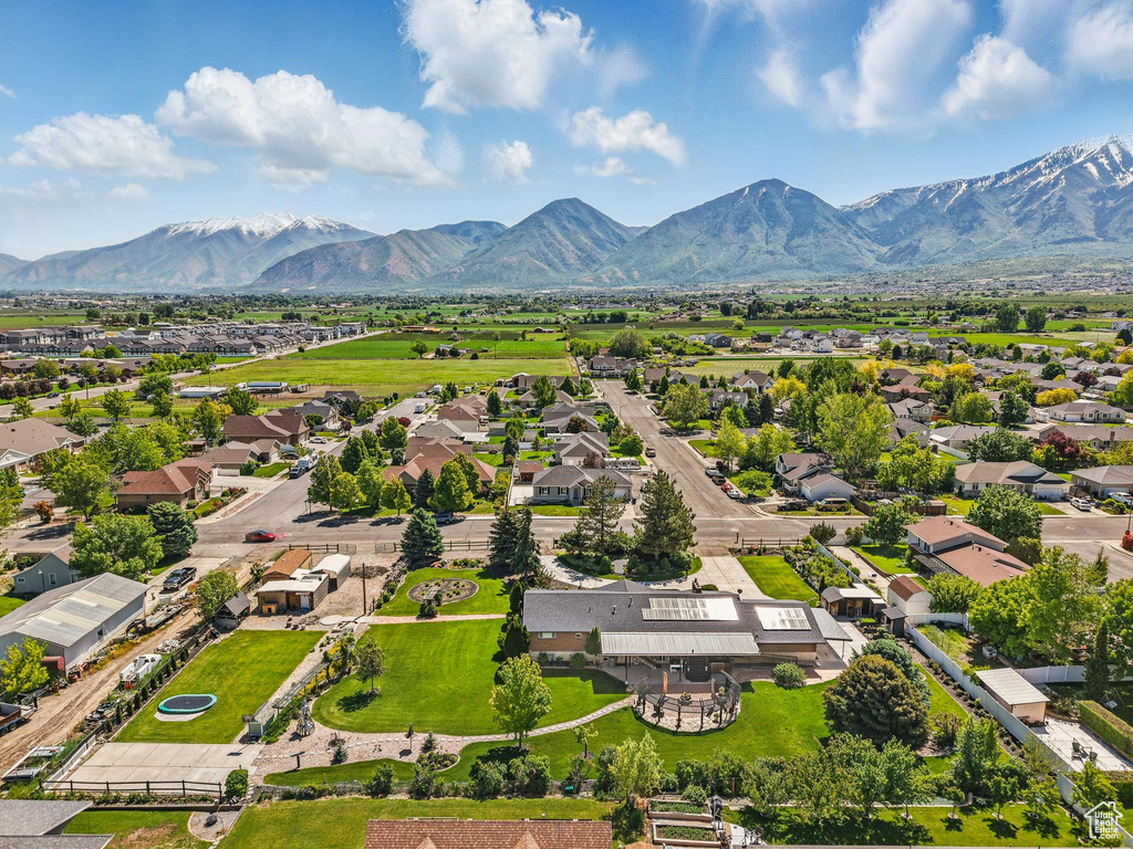Aerial view of residential area featuring mountains